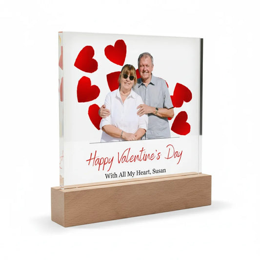 Valentine's Day Acrylic plaque with a couple photo and red hearts on a white background