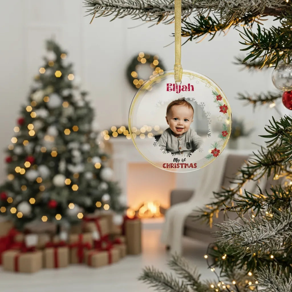 Personalized Christmas ornament with a child's photo and name, hanging on a decorated tree.